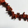 Vintage Curved Lentil Beads in Orange and Black - 88 Pieces - Image 2