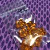Glass Flower Beads in Orange - 16 Pieces - Image 4