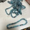 One dozen strands blue/black 5x10 mm rectangle India glass 12 strands