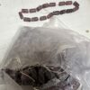 One dozen strands amethyst/black 5x10 mm rectangle India glass 12 strands