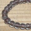 One dozen strands rose/goldstone, with clear casing. 6mm round India glass - Image 2